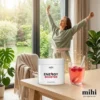 Des personnes rayonnantes célébrant leur bien-être et leur vitalité retrouvée grâce à une boisson énergétique.